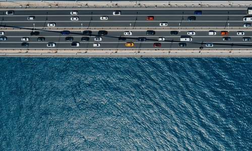 Cars driving across a bridge