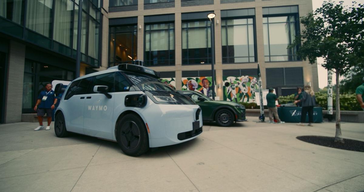 Waymo autonomous vehicle on display during the 2026 Mobility Summit in East Lansing.