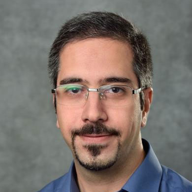 Professional headshot of Ali Zockaie