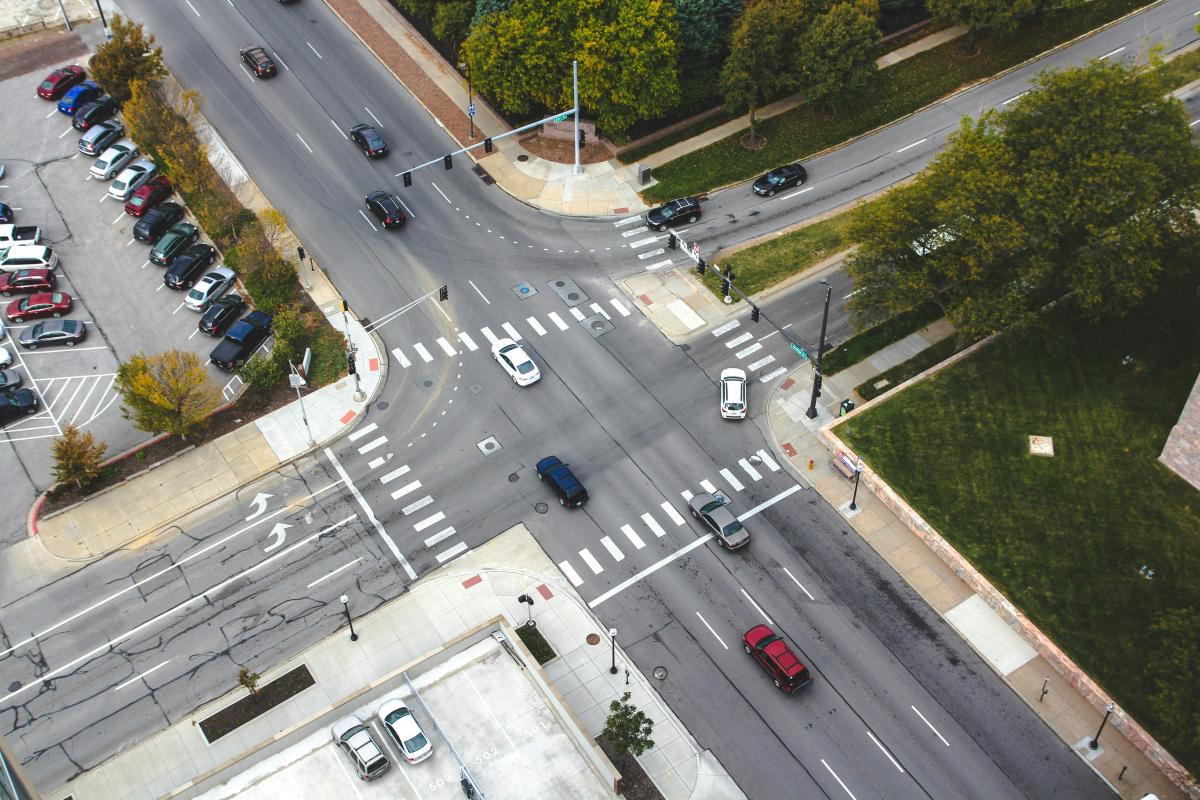 Overhead shot of intersection with traffic.