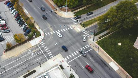 Overhead shot of intersection with traffic.